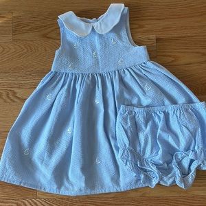 Seersucker with little sailboat embroidery dress comes with matching bloomers.